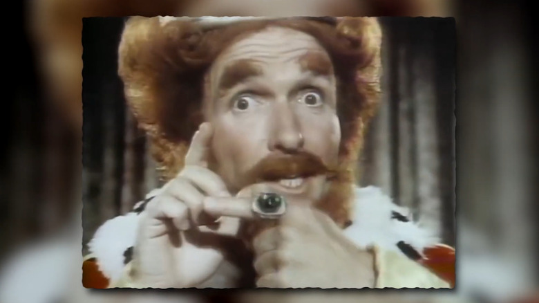 Close-up of the Magical Burger King holding his super powered ring