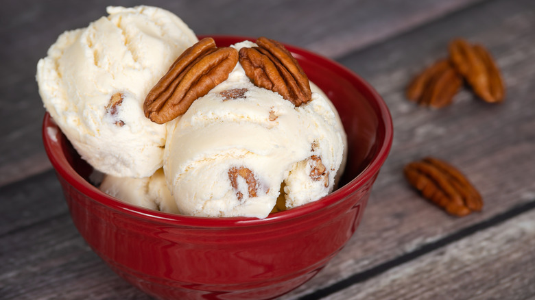 butter pecan ice cream in a red bowl
