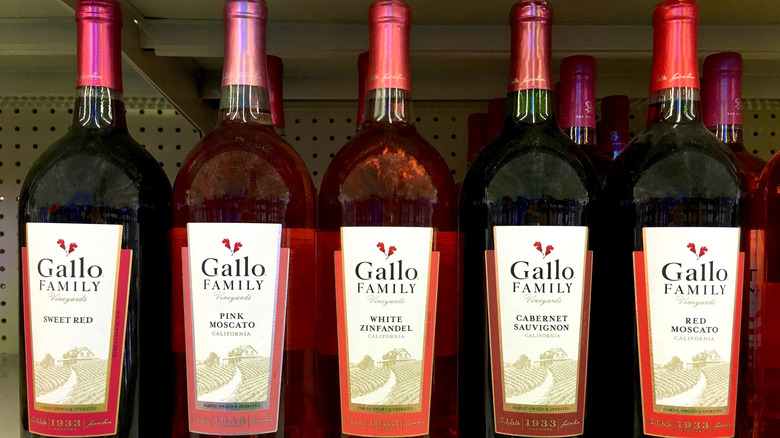 Bottles of Gallo Family Wine sit on a grocery store shelf