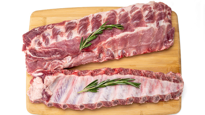 raw ribs laying on cutting board