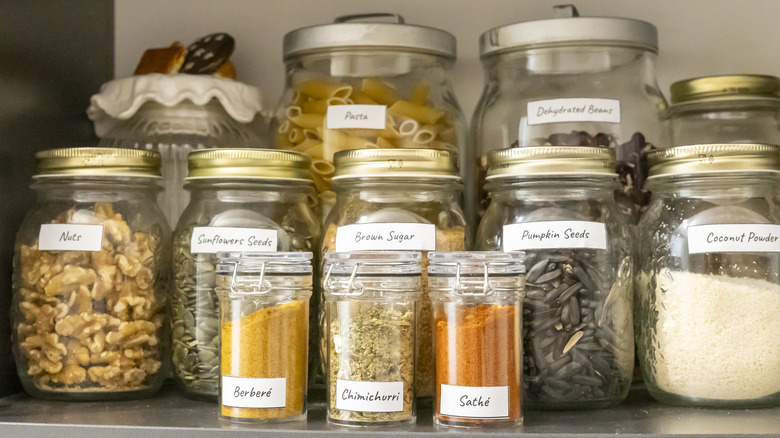 Organized pantry with labeled jars