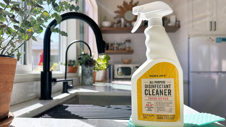 A bottle of Trader Joe's All-Purpose Disinfectant Cleaner on a sink