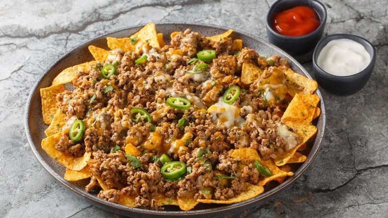 Bowl of ground beef cheese nachos