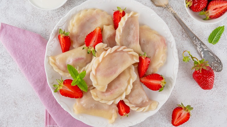 Sweet pierogies with strawberries