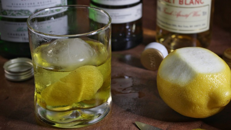 white negroni ice lemon garnish