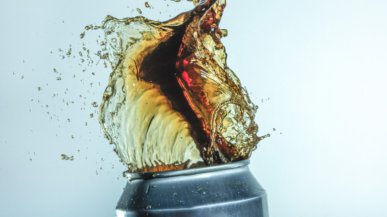 A soda can bursting.