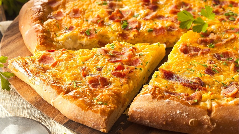 Breakfast pizza with cheese and bacon