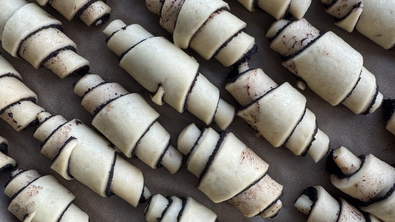 Unbaked rugelach on a baking sheet