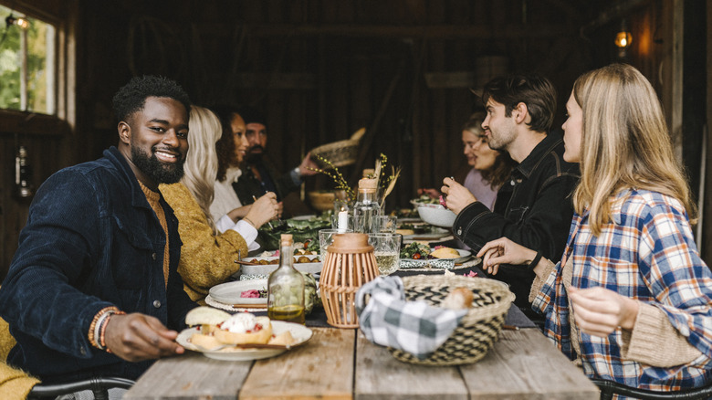 Friends sitting at a dinner table