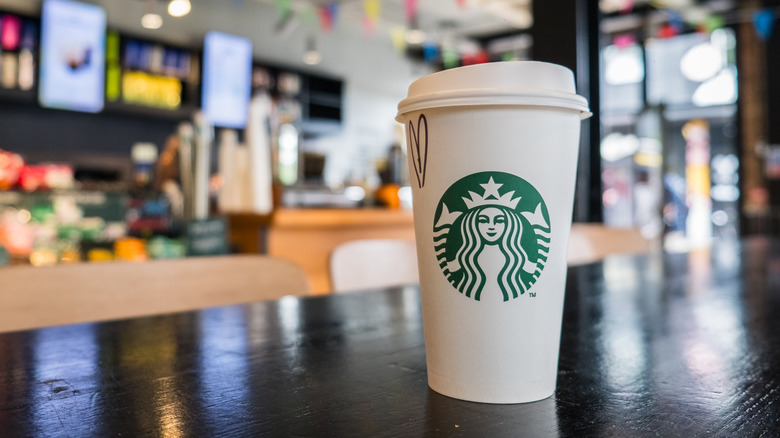 a close up of Starbucks cup