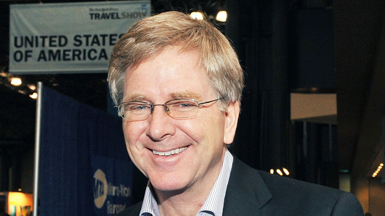 Rick Steves smiles at a travel show