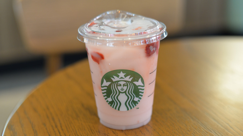Starbucks pink drink on a table