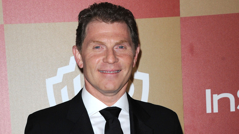 Bobby Flay smiling at event