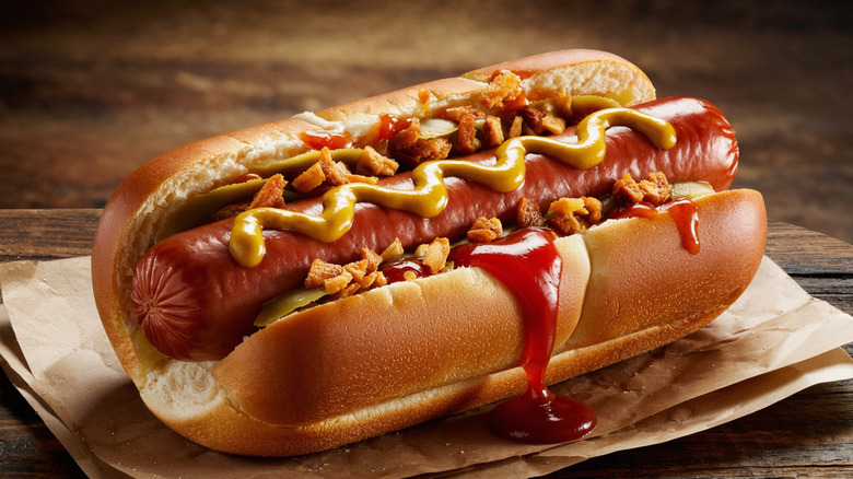 A hot dog with crispy toppings