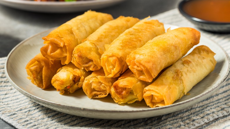Filipino lumpia served with dipping sauce