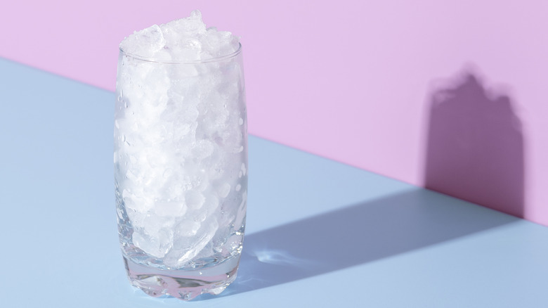 Two containers filled with ice cubes