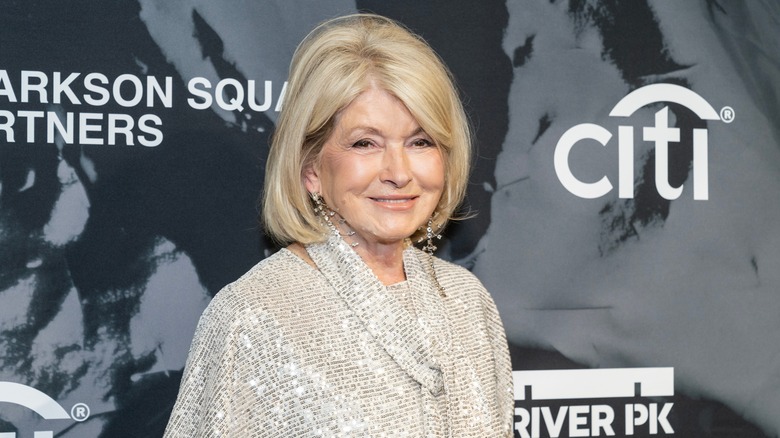 Martha Stewart smiling for cameras at an event
