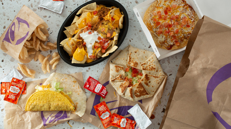 A variety of Taco Bell food items on a table