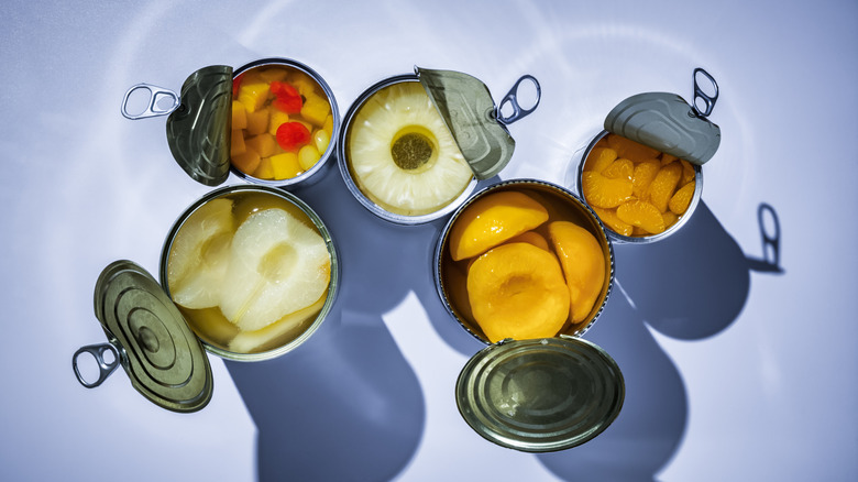 A top view of opened canned fruits