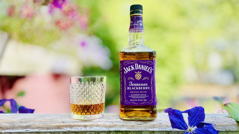 Bottle and glass of Jack Daniel's Tennessee Blackberry Whiskey