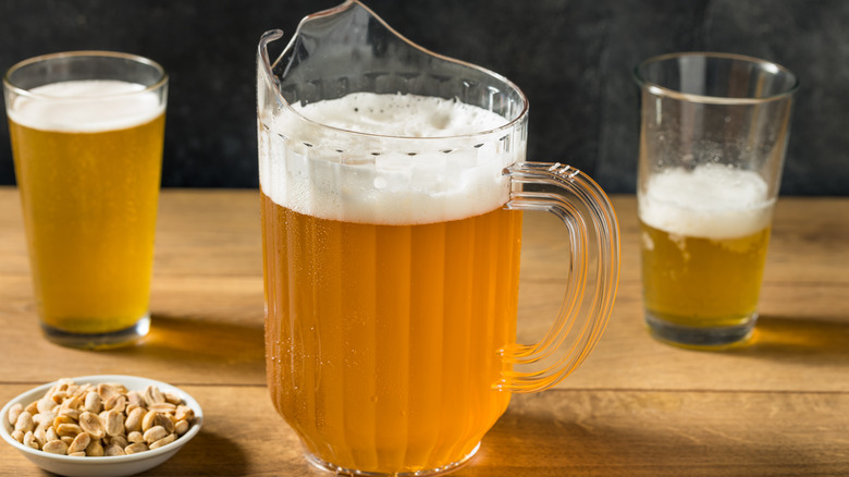beer pitcher served with glasses
