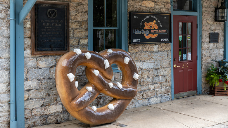The Julius Sturgis Pretzel Bakery in Lancaster County is the first commercial pretzel bakery in the US. It's exterior includes a large, oversized pretzel sign.