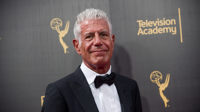 Anthony Bourdain smiling at a public event.