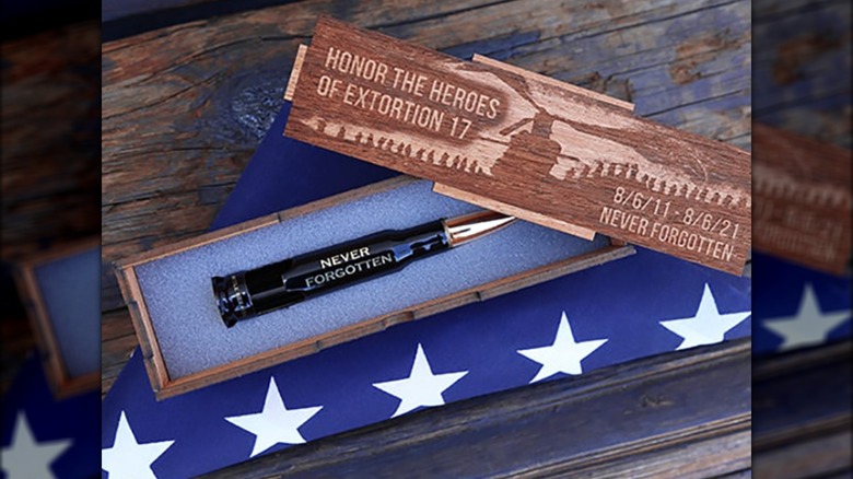 A Bottle Breacher bottle opener in a box