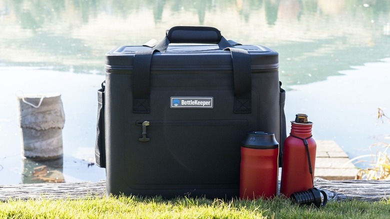 BottleKeeper insulated bag next to a lake