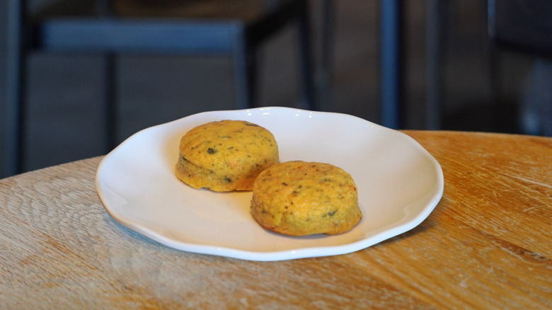 Italian Sausage Egg Bites on a while plate on a wooden table