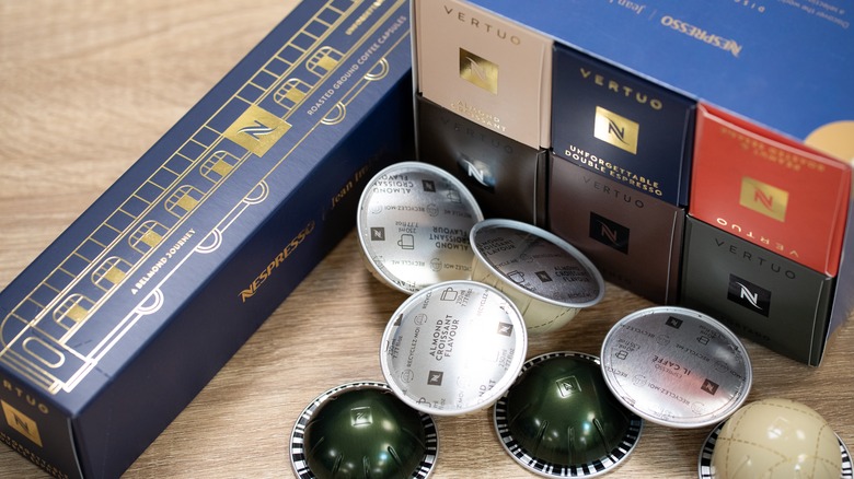 Vertuo Nespresso pods and boxes on a table