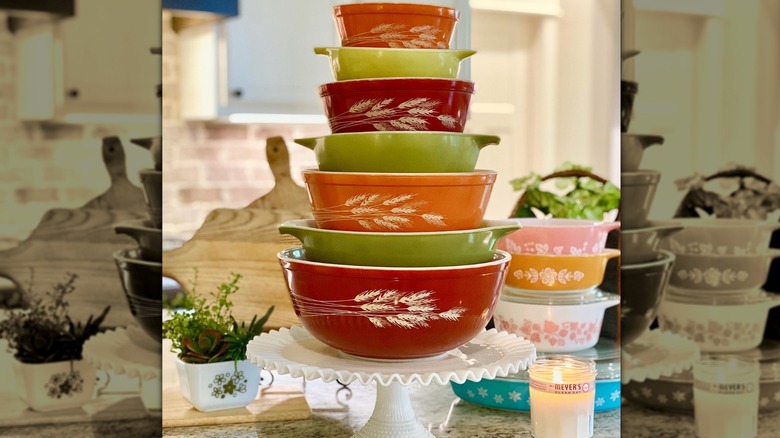 a stack of patterned Pyrex bowls