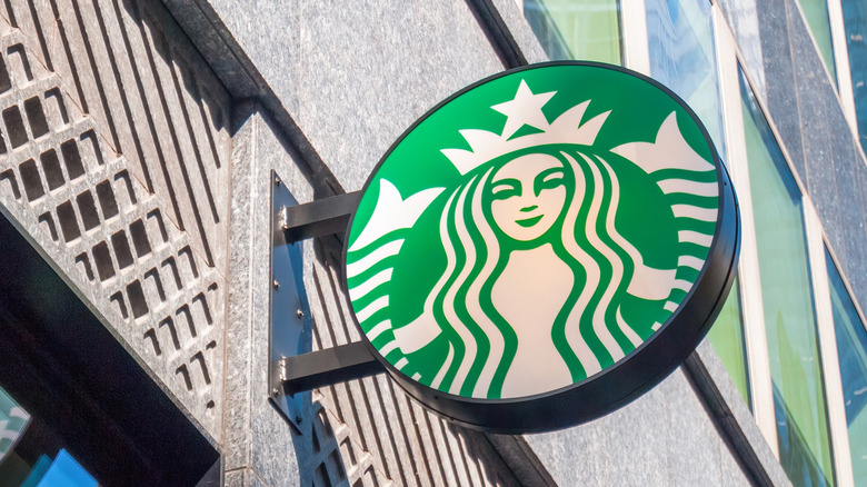 Starbucks sign on gray building