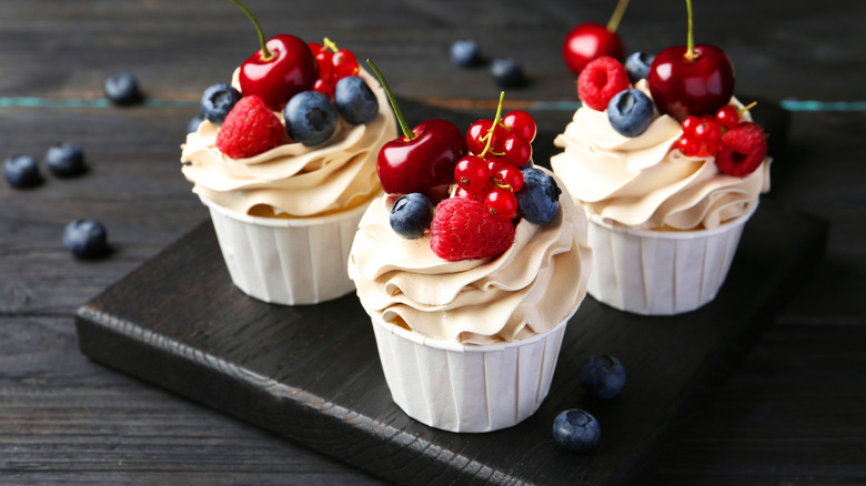 Cupcakes topped with berries