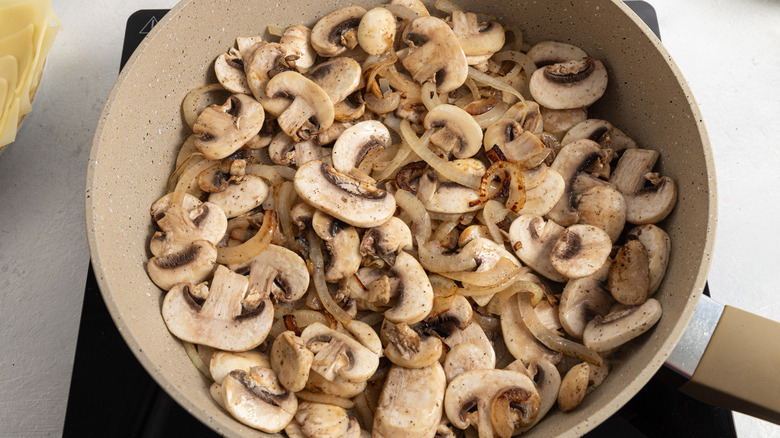 mushrooms and onions in pan