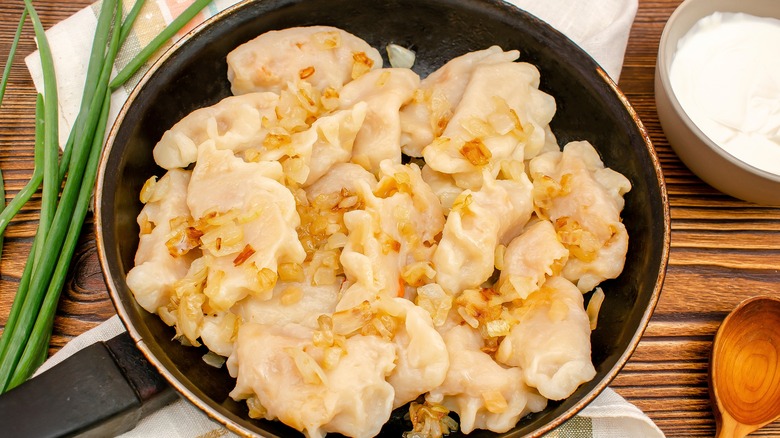 Sautéed pierogies with onions