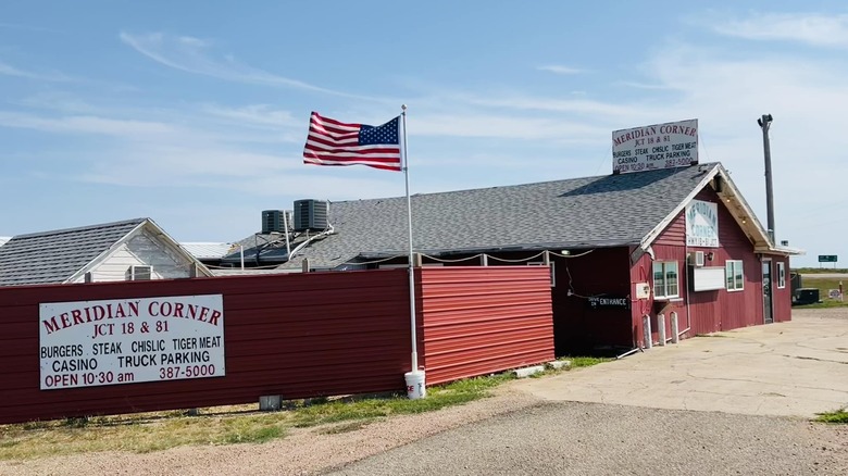 Red storefront of Meridian Corner
