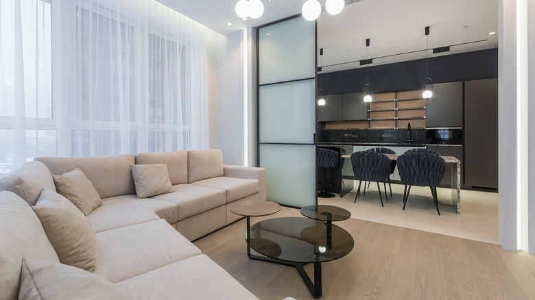 Living room separated by kitchen by a sliding door