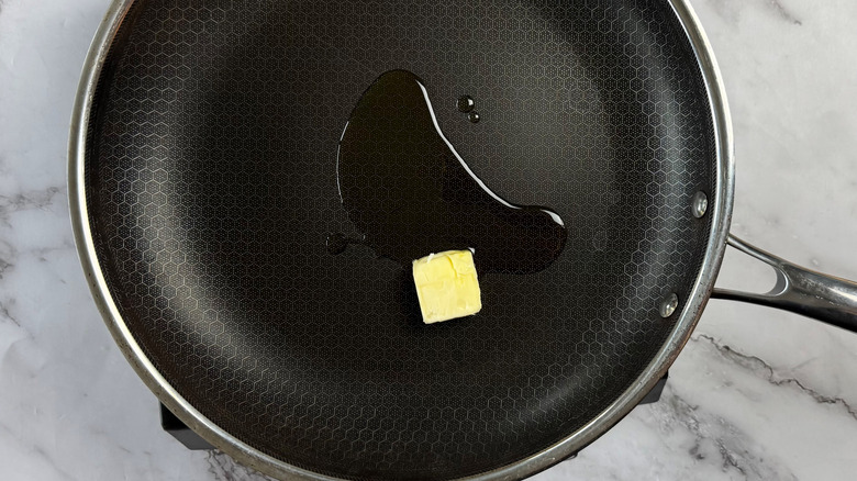 butter and oil in frying pan