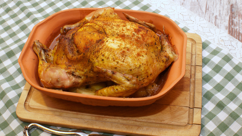 Roast chicken in clay Römertopf