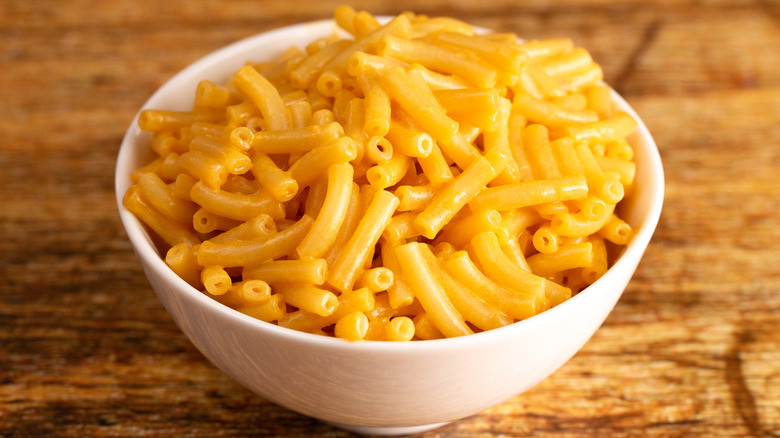 Classic boxed mac and cheese in a white bowl.
