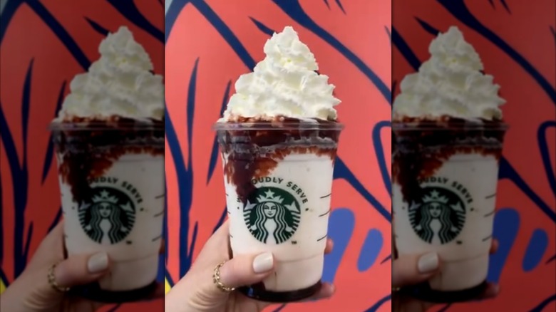 A vanilla frappuccino with strawberry sauce captioned "Vampire Frappucino"