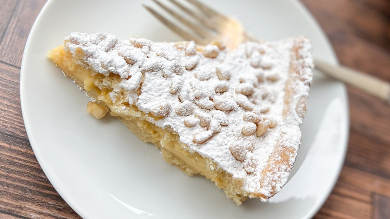 torte with powdered sugar topping