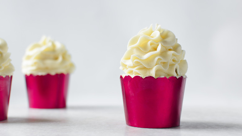 Cupcakes in fancy red foil wrappers
