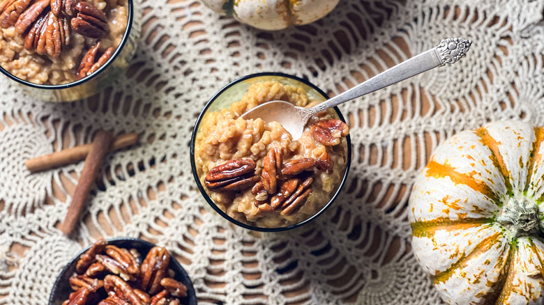 Vegan pumpkin pecan rice pudding in bowls