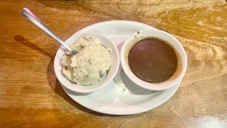 Texas Roadhouse's Mashed Potatoes with side of brown gravy