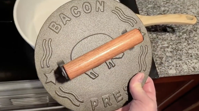 Hand holding the Bellemain Bacon Press